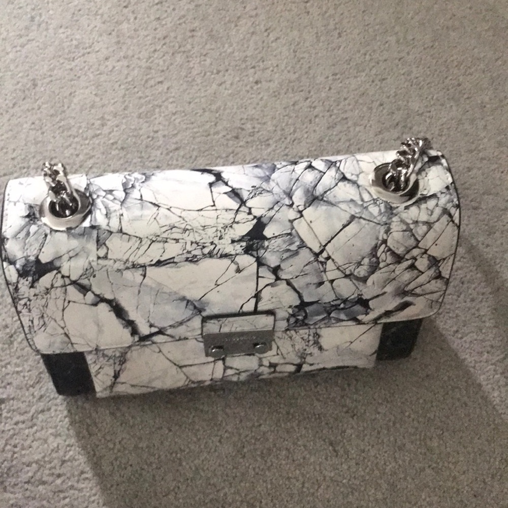 Voyage shoulder bag 100% NEW with TAG